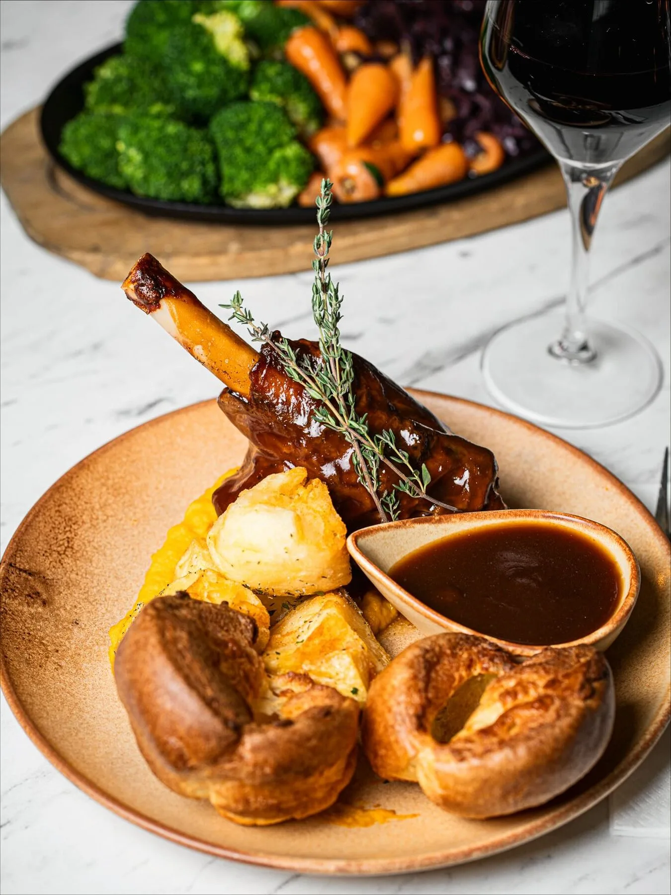 Sunday roast lamb shank with Yorkshire puddings at Bistro Franc